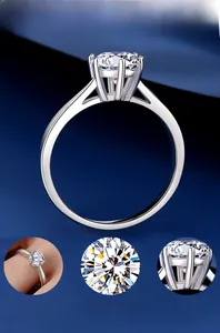 Detailed view of silver six-prong moissanite ring with side profile and diamond brilliance