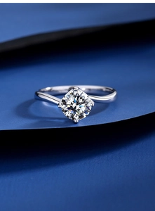 Macro shot of S925 sterling silver twisted band ring with a brilliant round moissanite