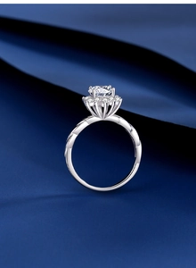 Detailed macro view of S925 silver sunflower ring with a brilliant Moissanite center stone
