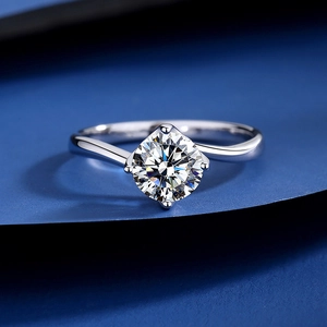 Elegant S925 silver twisted band ring with round moissanite in four-prong setting