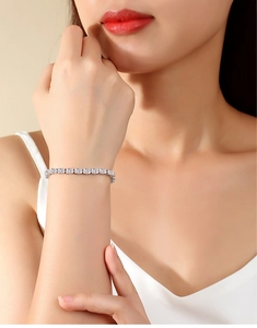 Detail of elegant S925 silver tennis bracelet with brilliant-cut round zircon stones