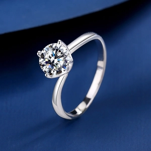 Elegant S925 silver moissanite ring with four-prong round solitaire and twist band design