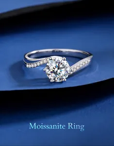 Macro detail of 925 silver moissanite ring with twisted band on dark blue background