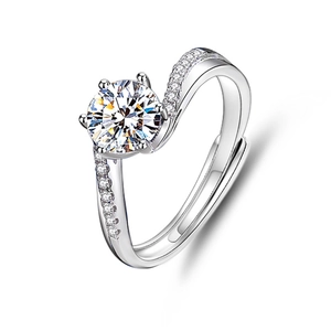 Macro detail of 925 silver moissanite ring showing S-shaped band and six-prong setting