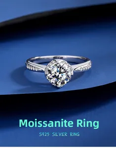 Macro shot of S925 silver moissanite ring with crown setting on dark background