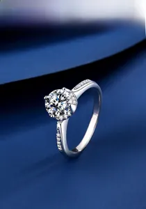 Macro shot of a four-prong S925 silver ring featuring a sparkling moissanite stone