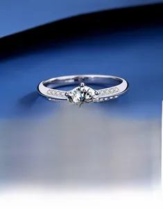 Detail of S925 sterling silver ring featuring a six-prong moissanite stone setting
