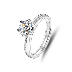 Macro shot of s925 silver moissanite ring with six-claw crown setting and side diamonds