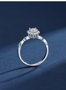 Macro shot of S925 silver moissanite ring with twisted band and sparkling flower cluster