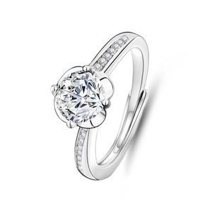 Macro shot of S925 silver ring featuring a six-prong flower setting and sparkling moissanite
