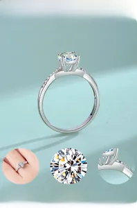 Detailed macro view of S925 silver moissanite ring with four-prong setting and pavé accents