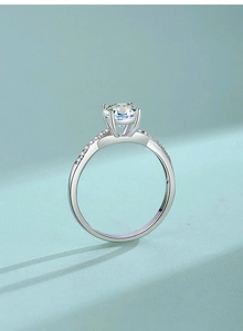 Detailed side view of a S925 silver moissanite ring featuring a classic six-prong setting
