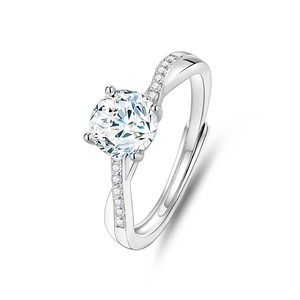 Detail of S925 sterling silver ring with twisted band and four-prong moissanite setting