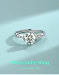 Macro detail of Moissanite ring in S925 silver with lotus flower and side diamonds