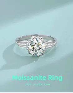 Macro view of 2 carat moissanite ring with S925 silver flower setting and micro-pave diamonds