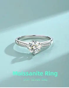 Detailed close-up of S925 sterling silver moissanite ring with classic four-prong setting