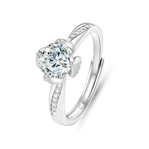 Macro shot of silver S925 lotus flower ring with moissanite center stone and pavé accents