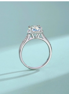 Detailed view of 2ct round Moissanite ring in four-prong S925 silver setting