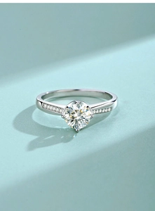 Detailed view of s925 silver ring featuring a six-prong moissanite and pave diamonds