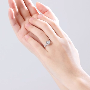 Elegant lotus flower S925 silver ring with moissanite center stone on model's hand