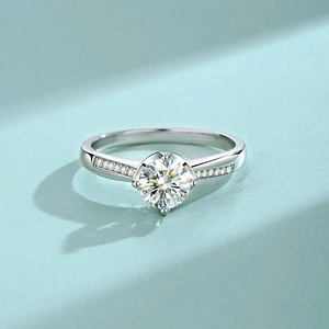 Classic S925 sterling silver moissanite ring with four-prong setting and side accents
