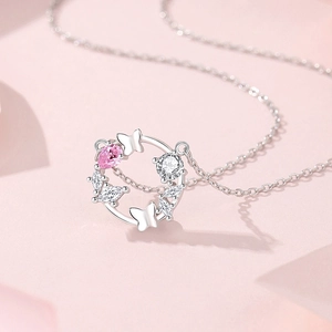 Elegant S925 sterling silver butterfly wreath necklace with pink gemstone pendant