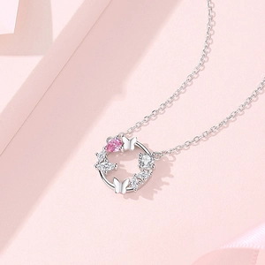 Elegant S925 silver necklace with butterfly wreath pendant and pink gemstone
