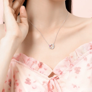 Elegant S925 sterling silver butterfly wreath necklace with pink zircon on a female model
