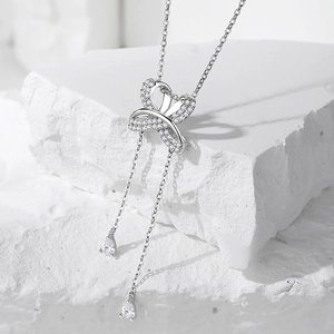 Collier en argent S925 avec pendentif nœud cœur et glands en pierre zircon