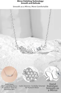 Macro view of polished S925 sterling silver heart necklace with zircon crown and butterfly