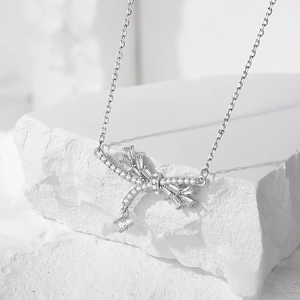 Elegant S925 silver dragonfly pendant necklace with sparkling cubic zirconia on stone base