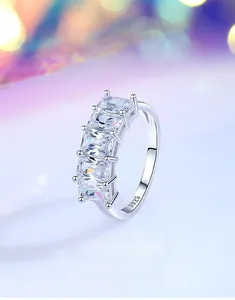 Macro detail of S925 sterling silver ring featuring five square-cut moissanite stones