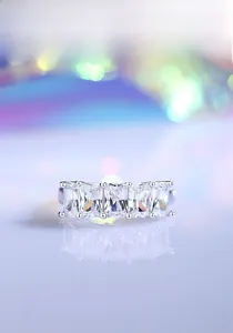 Detailed macro view of S925 silver ring featuring five rectangular cubic zirconia stones