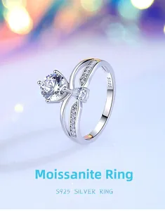 Macro shot of 1ct Moissanite crown ring showing S925 hallmark and side stone detail
