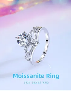 Macro detail of crown moissanite ring showing S925 silver stamp and pavé setting