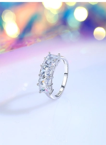 Macro shot of S925 sterling silver ring with five emerald-cut cubic zirconia stones