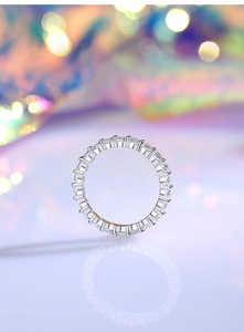 Macro shot of S925 sterling silver eternity ring featuring full circle claw-set zircons