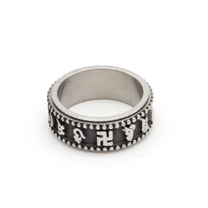 Buddhist spinner ring in titanium steel featuring six-character mantra and relief pattern