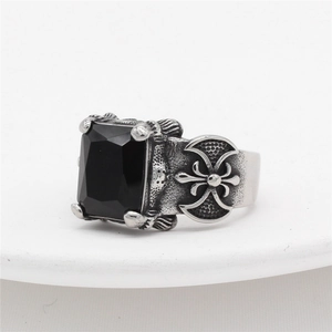 Vintage viking ring with black gemstone and gothic engraving in antique silver finish