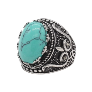 Vintage punk silver stainless steel ring featuring a large oval turquoise with filigree