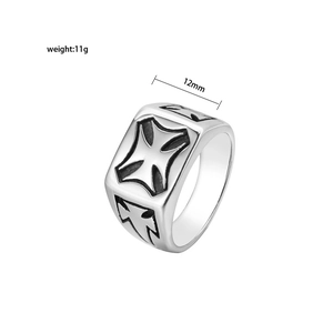 Detail view of vintage male signet ring showing engraved Maltese cross and 12mm width