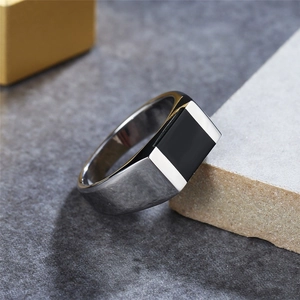 Polished silver stainless steel ring for men with a large rectangular black agate inlay