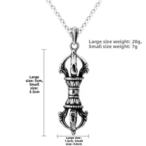 Detail view of vintage Vajra pendants with large 5cm and small 3.5cm size specifications