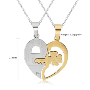 Detail of clover key and lock couple necklace with I Love You engraving and zircon