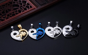 Detailed view of four pairs of interlocking heart pendants with clover cut-outs and I LOVE YOU text