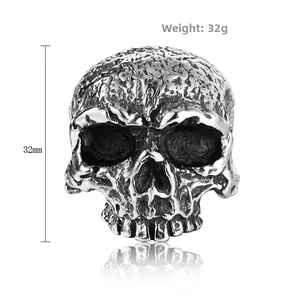 Detail view of gothic skull ring in vintage silver showing 32mm height and 32g weight
