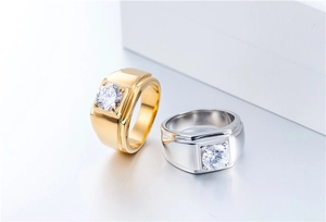 Polished silver and gold men's titanium rings with square cut center stone detail