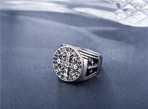Detail of St. Benedict medal ring in silver stainless steel with vintage cross engraving