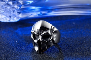 Close-up of vintage Spartan skull ring in distressed silver titanium steel with gothic details