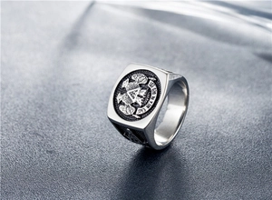 Macro shot of a Masonic 32nd degree eagle signet ring in vintage stainless steel